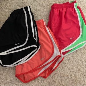 three pairs of nike shorts